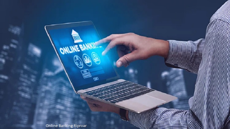 Person using online banking on a laptop to access secure digital banking services at Online Banking Riproar